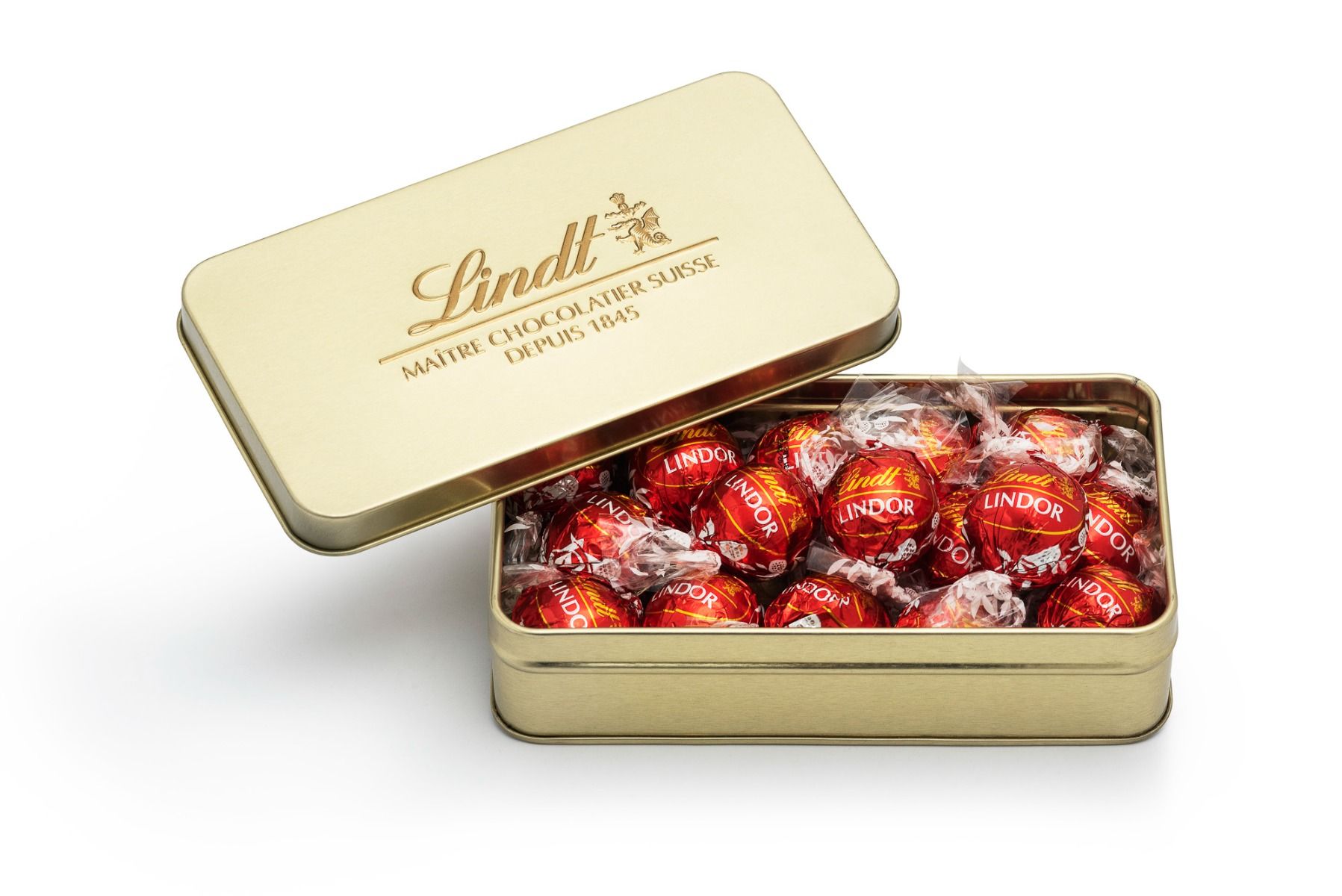 Lata Dorada LINDOR con Bombones de Leche 150g
